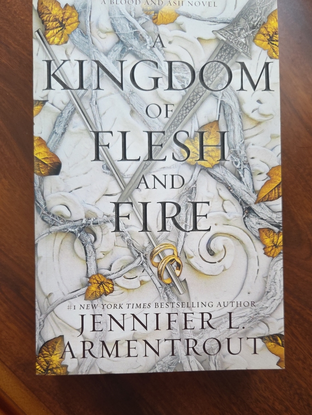 A Kingdom of Flesh and Fire by - White & Gold Cover